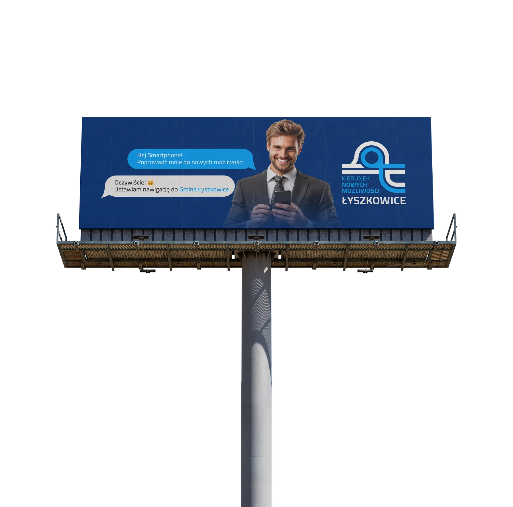 Outdoor · billboard przy drodze Billboard 6×3 m Gminy Łyszkowice z hasłem „Hej Smartphone — poprowadź mnie do nowych możliwości”